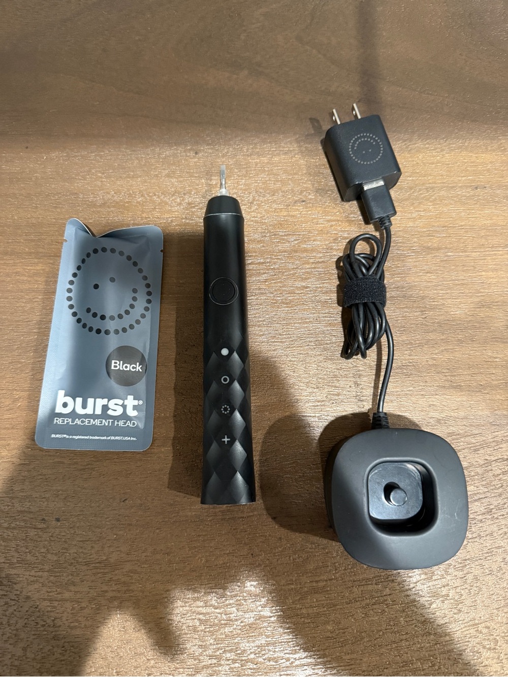 Black Electric Toothbrush with Charger and Replacement Head